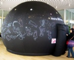 Black sky planetarium dome tent